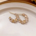 Elegant gold-tone C-shape hoop earrings with champagne crystal on white ceramic plate - C-Shaped Multi-Faceted Crystal Earrings (22#) / Gold-Transparent (22#)