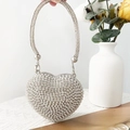 Close-up of heart-shaped mini purse with silver rhinestones and crystal-encrusted handle - Mini / Silver Rhinestone Circle