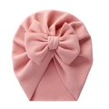 Pink knit baby turban hat with a large decorative bow made of soft ribbed fabric - Pink