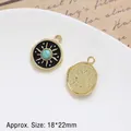 Macro detail of vintage sun pendant with turquoise bead and black enamel, size 18x22mm - Style 8 Black Turquoise Sun (18*22mm)