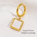 Macro detail of 16mm gold hoop earring with white enamel square charm on white fabric - White Shell Square