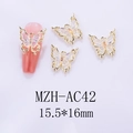 Macro view of laser gradient butterfly nail charms on light orange nail tips - Gold Frame Aurora Clear (AC42)