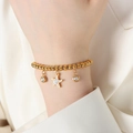 Elegante bracciale a sfere dorate con stella marina scintillante e ciondoli in zircone - 24cm / Oro