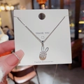 Roterende konijn hanger ketting in zilver met fonkelende zirkoon en fijne ketting - Konijn / Zilver