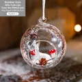 Festive clear glass Christmas ball ornament featuring a white reindeer and red mushrooms - Elk Style