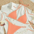 Coral orange ribbed bikini set with halter top and side-tie thong for beach vacations - Pink Orange