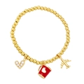 Gold beaded stretch bracelet featuring heart, red coffee cup, and airplane charms - Red