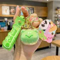 Simpatico portachiavi a rana in acrilico verde con cinturino in silicone e campanello - Versione Senza Rossore / Rana