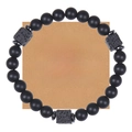 Close-up of black matte stone bead bracelet with lava rock accents on a gift message card - To My Grandson