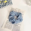 Floral scrunchie in light blue with white daisies and red center floral print - Ocean Small Flower