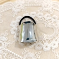 Minimalist silver metal hair tie with black elastic band on elegant lace background - Silver Trapezoid