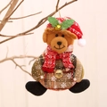 Oso de peluche navideño con sombrero de cuadros rojos y cascabel dorado - Oso con Cascabel