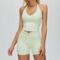 Women's mint green yoga set with halter neck top and high-waist ruched gym shorts - S / Top And Bottom / Mint Green