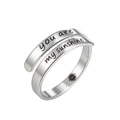 Macro detail of 'you are my sunshine' engraving on silver-toned adjustable open ring - You Are My Sunshine / Silver