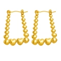 Golden beaded hoop earrings with heart-shaped charms and vintage metallic finish - Trapezoidal Beaded Heart