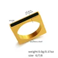 Macro view of geometric stainless steel ring with black acrylic inlay and 0.4cm width detail - US 6 / Gold