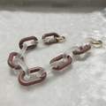 Detail of acrylic resin chain strap with matte white and dusty pink links and gold rings - Frosted Wine Red