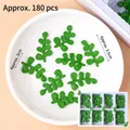 180pcs green fondant leaf cake decorations in 2cm and 3.5cm sizes for Christmas styling - Chocolate Clover Leaves Decorations 180 Pcs