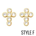Close-up of golden cross stud earrings with clear round cubic zirconia inlay details - Type F - Bezel-set White Zircon Cross