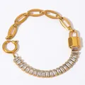 Detail of a gold link bracelet with rectangular cubic zirconia and a lock pendant charm - Padlock Patchwork Rectangular Zirconia Style (A767) / Gold