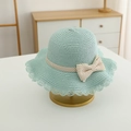 Detail of light green straw sun hat with polka dot bow and hollow lace brim design - Straw Hat / Lake Blue