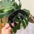 Elegant black acetate hair claw clip with octopus design and gold France handmade logo - Thickened Semicircular Bone Claw / Black