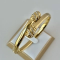 Polished 18K gold plated stainless steel open bangle with sparkling cubic zirconia accents - Hammer Ball Pillar Gold Bangle