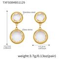 Detail view of gold stainless steel double round drop earrings with glass stone inlays - Gold - White Stone (TXF508)
