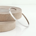 Polished silver minimalist open cuff bracelet displayed on natural wooden trays - 4mm / 4mm Steel Color