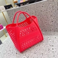 Detail of red hollowed-out silicone jelly tote bag with large diamond mesh design - Red