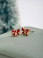 Cute red bow stud earrings with gold trim for Christmas themed jewelry collections - Red Bow
