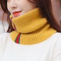 Chic striped knitted turtleneck neck warmer in yellow with red and green accents - Ginger Yellow