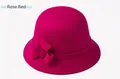 Detail of rose red wool cloche hat featuring a decorative side bow for winter fashion - M (56-58cm) / Rose Red
