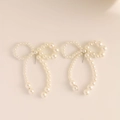 French style bow-shaped earrings crafted with elegant cream faux pearls and studs - Silver