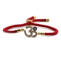 Adjustable red rope bracelet with golden 3D Evil Eye and Om symbol in blue zircon - Red Rope