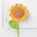 Handmade crochet sunflower with yellow petals and green leaves measured by a ruler - Single Sunflower Stem With A Single Leaf (7 Rings Stem Length 40cm)