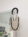 Detail of off-white crochet bag with hollow mesh texture and chunky black chain - Off-white + Shoulder Strap Set