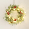 Christmas wreath with PE red berries pine cones and warm LED lights on white background - Snowy PE Red Berry Wreath (With LED Light)
