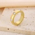 Polished 18K gold plated ring featuring a single row of sparkling round zircons - Bezel Set Style (KR111070-K)