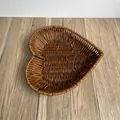 Brown heart-shaped wicker snack basket 28x25x5cm with decorative wavy edges on wood desk - Heart-Shaped Large / Dark Coffee