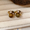 Detailed view of vintage tiger eye stud earrings with pearls and gold beads on fabric - 16# Silver Pin - Gold - Brown - Flower Cluster