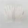 Macro shot of fluffy white coral fleece winter gloves with elastic ribbed cuffs - One Size / White