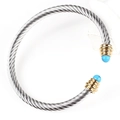 Silver cable cuff bracelet with gold screw-end detail and blue gemstone accents - Two-tone Gold & Silver with Turquoise