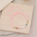 Bracciale bohémien fatto a mano con perle rosa opache e ciondolo in perla barocca bianca - Rosa
