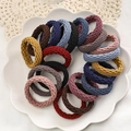Set of colorful elastic hair bands in woven fabric displayed on a white petal plate - Grid Pattern / 20 Pieces / Multicolor