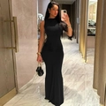 Detail of a slim fit black sleeveless fishtail maxi dress with elegant waist ruching - S / Black