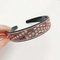 Black headband with champagne and pink rhinestones in geometric crystal patterns - Champagne Crystal Purple