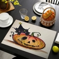 Detailed weave texture of a Halloween linen placemat featuring a black cat and pumpkin design - Style 4