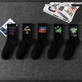 Five-pack of black crew socks featuring colorful street-style graffiti and slogans - One Size / Black Printed Series (17-04-02-08-11)