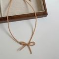 Detailed view of handmade bow pendant necklace with champagne crystal faceted beads - 11# Champagne